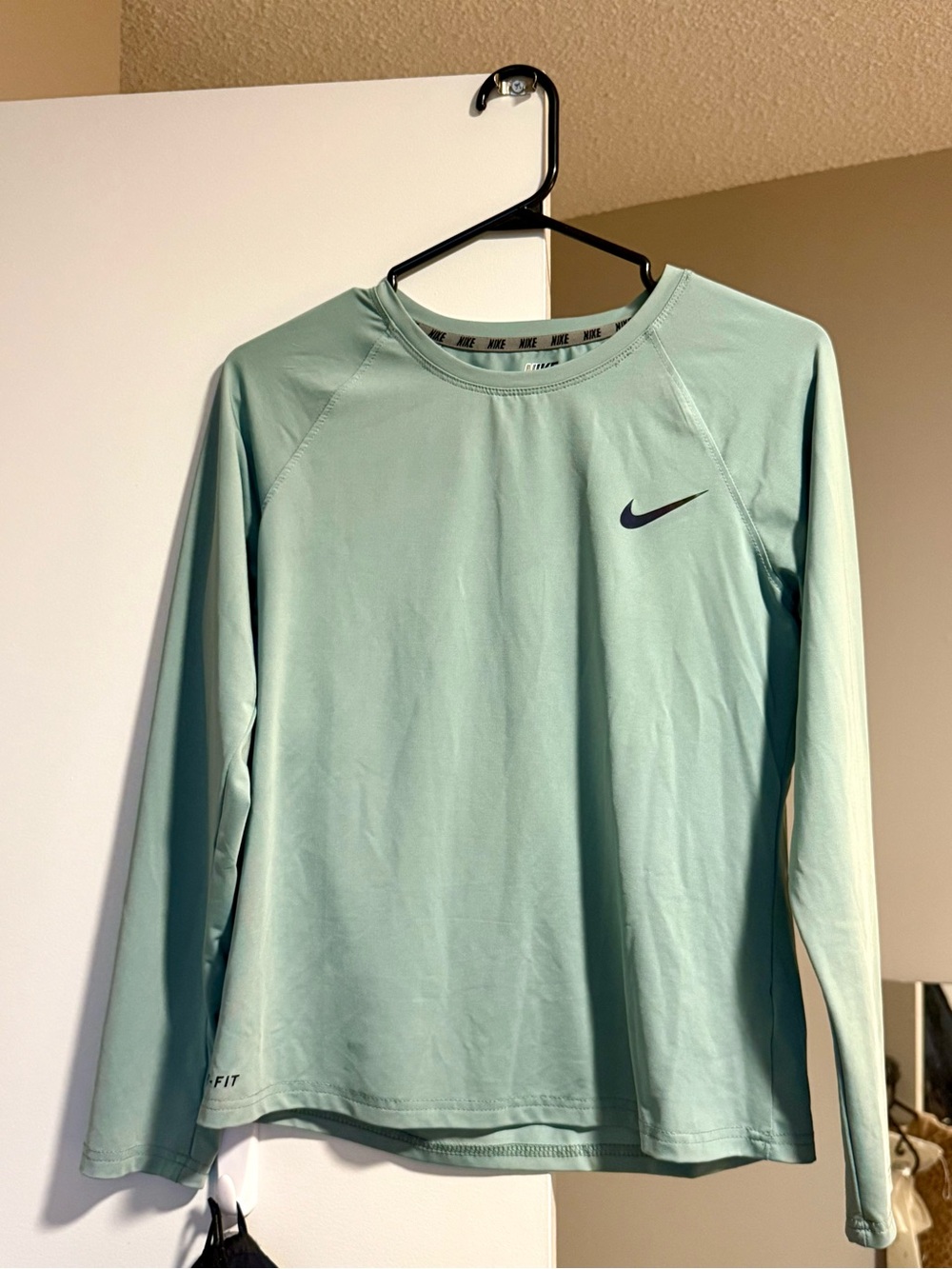Nike Long-Sleeve Performance Top in Light Green with Navy Swoosh